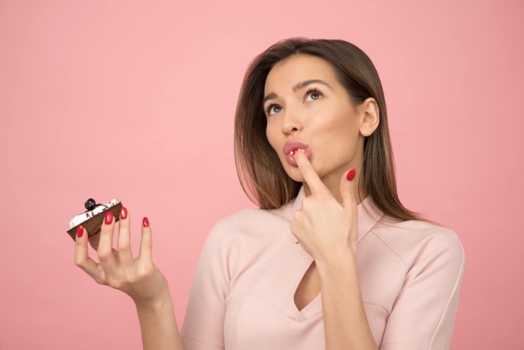 Woman eating dessert