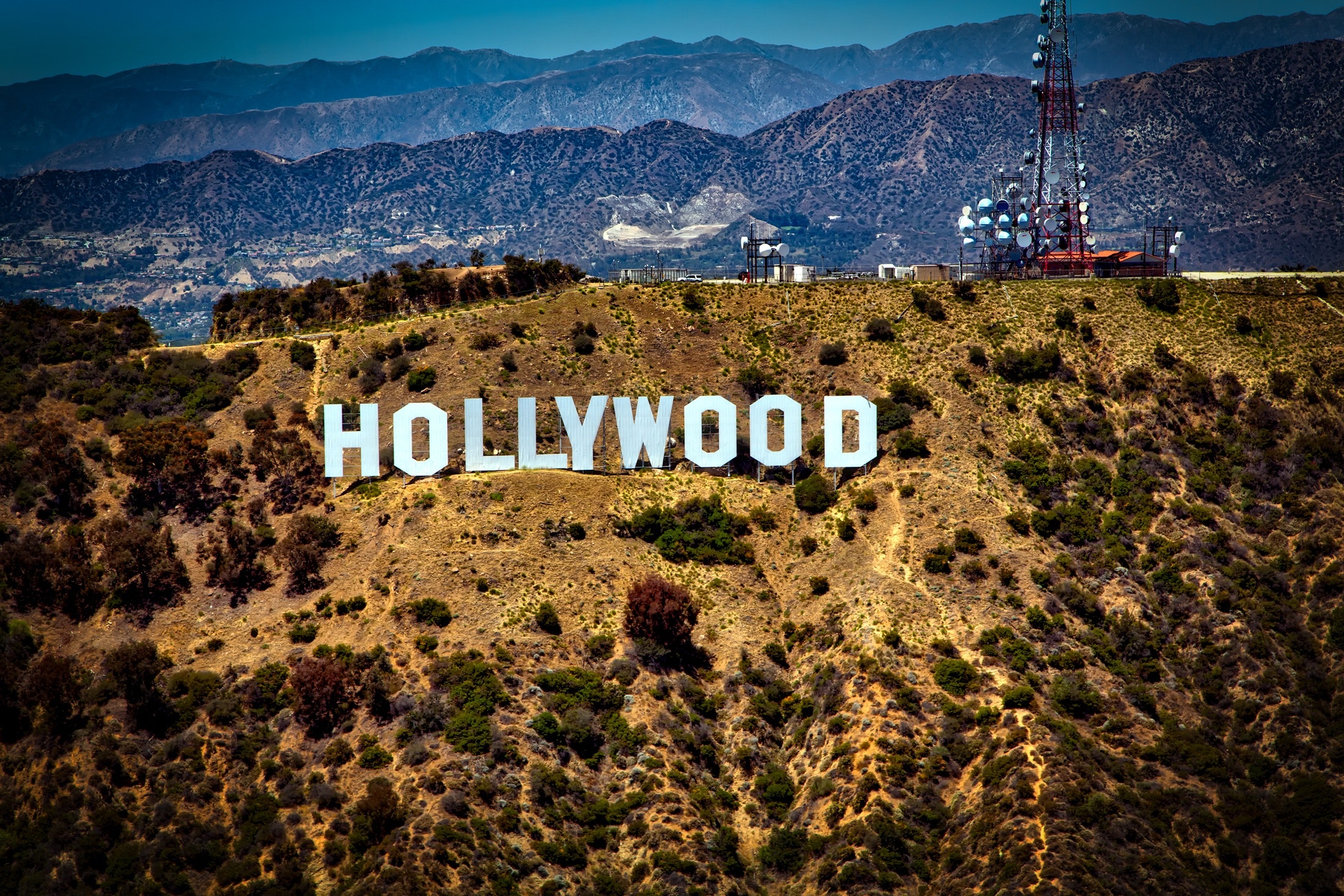 White hollywood sign on California hill