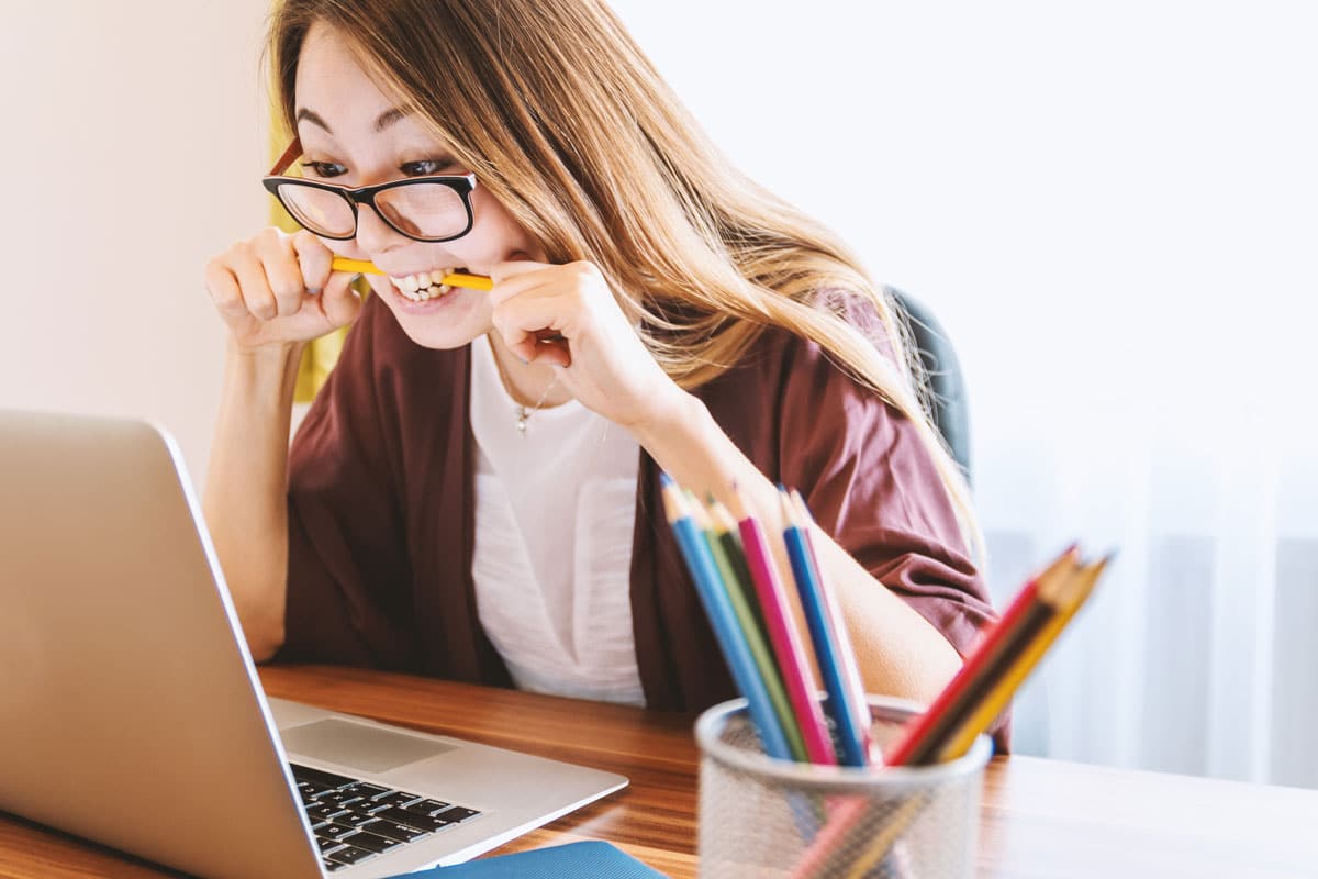 a woman is feeling irritated and facing mood swings in the workplace.