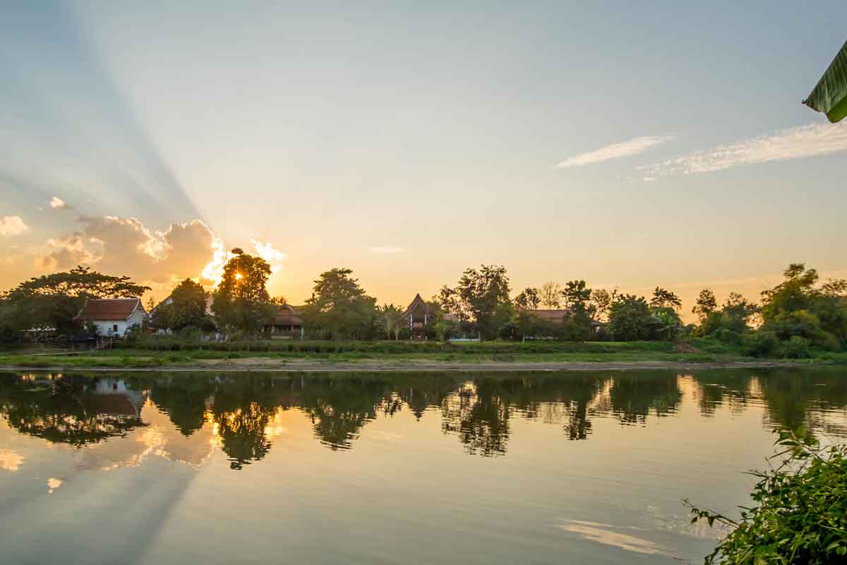 twilight over ping river chiang mai thailand