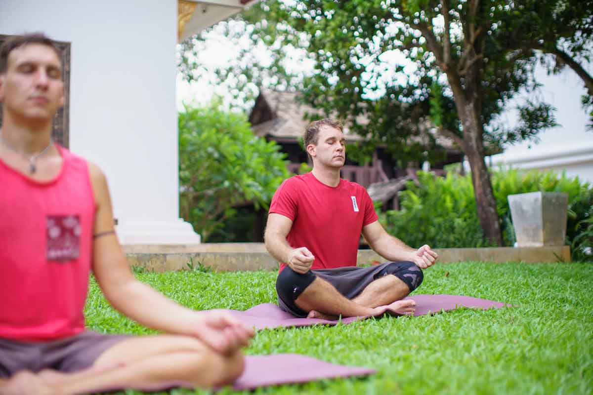 client meditating at the dawn